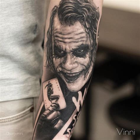 joker forearm tattoo.